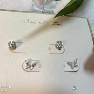 Two pair pierced earrings sterling silver, cubic Zirconia, by a new day #316